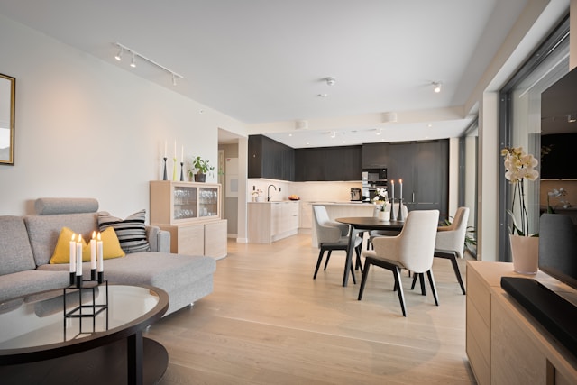 A living room filled with furniture and a flat screen TV